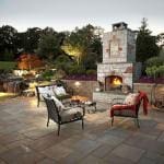 outdoor patio with landscape lighting and fireplace northern virginia, reston, leesburg